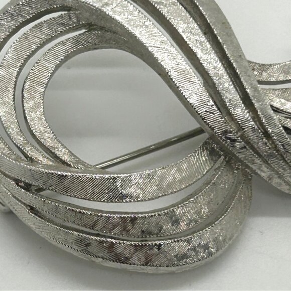 Vintage Monet Silver-Tone Brooch With Etched Textured Finish & Abstract Ribbon - Picture 5 of 13